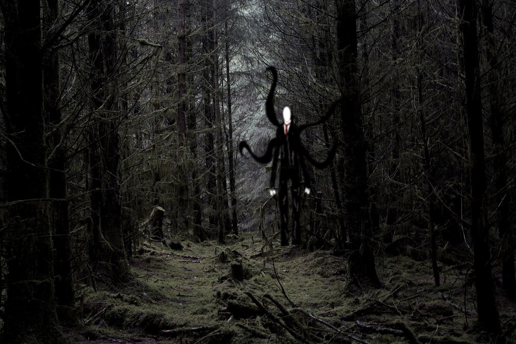 A drawing of Slender Man in some deep woods